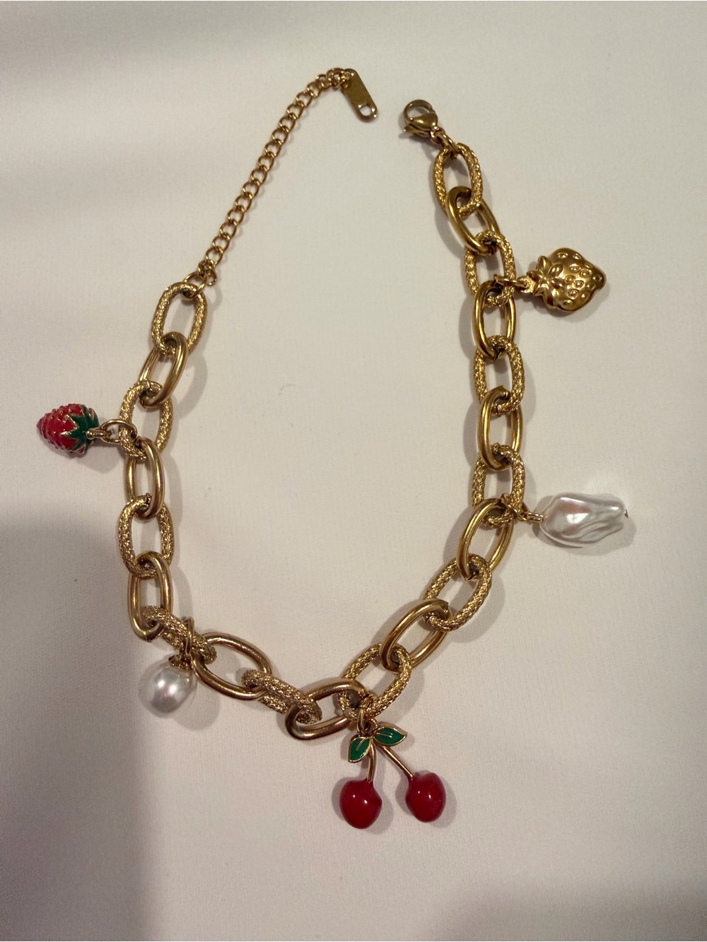 Gold Charm Bracelet with Red and White Accents - Picture 7 of 9